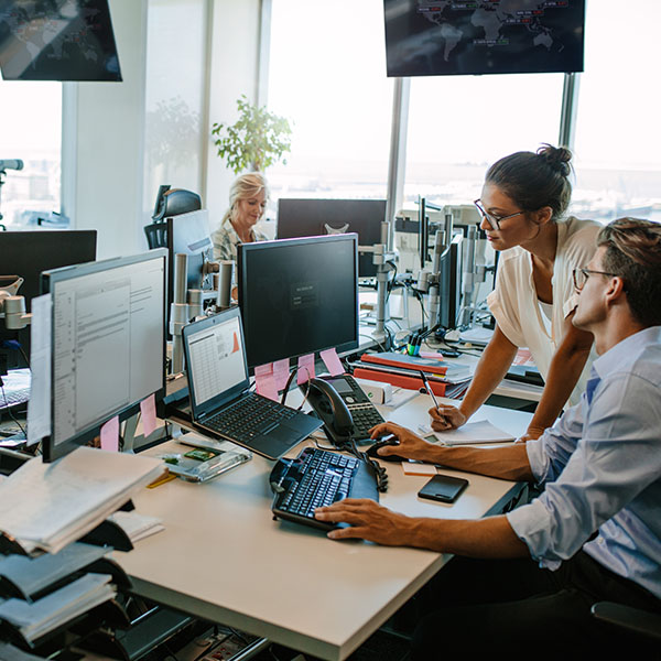 Workers in a busy office environment